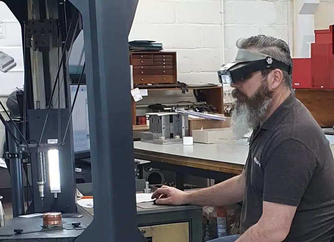 Pentagon4 Man from Pentagon Plastics using Deltron CMM to measure a component
