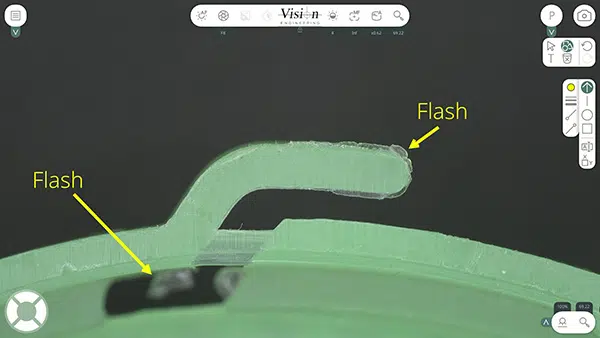 AURA-SS-Annotation-Plastic-Flash-600×338 Annotation sur une pièce en plastique indiquant une bavure